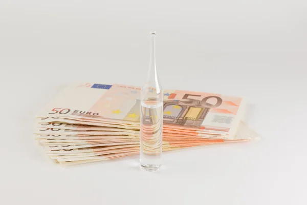 Money and medicines — Stock Photo, Image