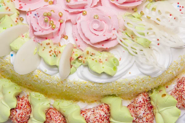 Sweet pie with cream roses — Stock Photo, Image