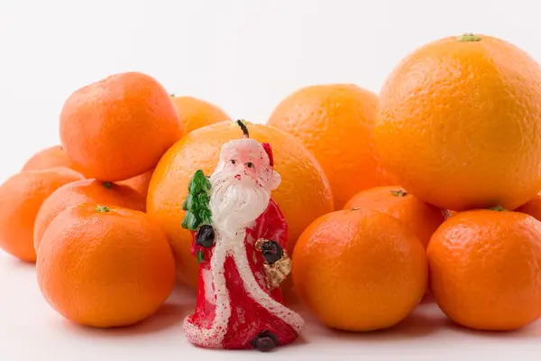 Scivolo mandarino con candela — Foto Stock