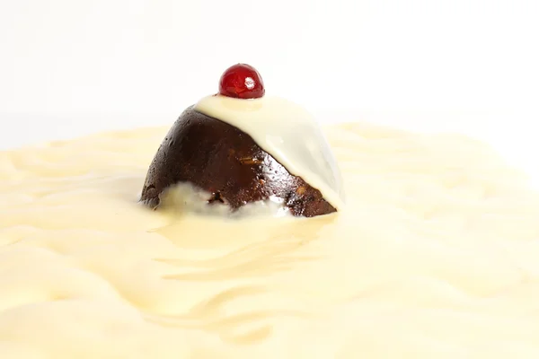 Pudding with custard. — Stock Photo, Image