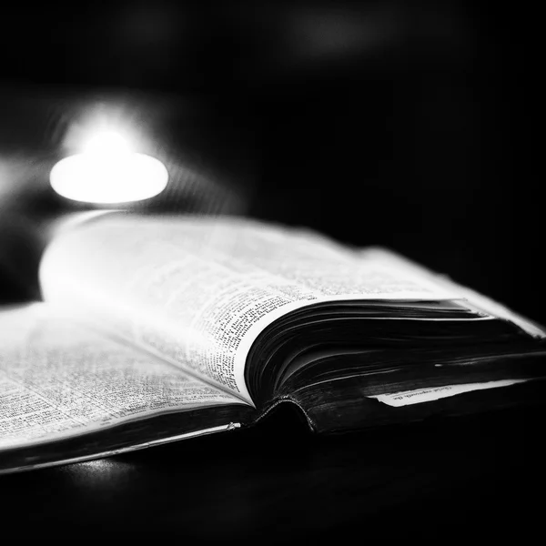 Bible with candles — Stock Photo, Image