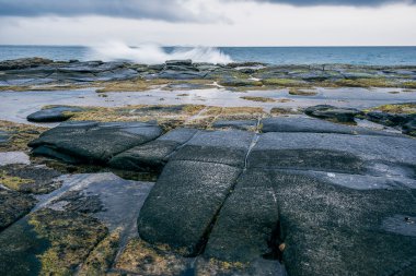 Kayalar ve nokta Cartwright, dalgalar