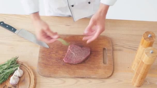 Cropped View Chef Putting Rosemary Branches Beef Steak Chopping Board — Stock Video