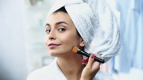 Young Woman Head Wrapped Towel Applying Foundation Face Cosmetic Brush — Stock Photo, Image