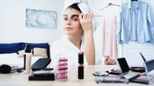 Young Woman Bathrobe Head Wrapped Towel Styling Eyebrow Brush Table — Stock Photo, Image