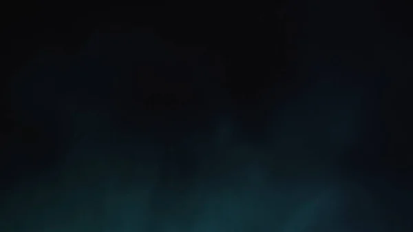 mavi toz siyah arkaplanda kopyalama alanı ile sıçrıyor