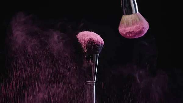 Cosmetic Brushes Pink Powder Falling Black — Stock Photo, Image