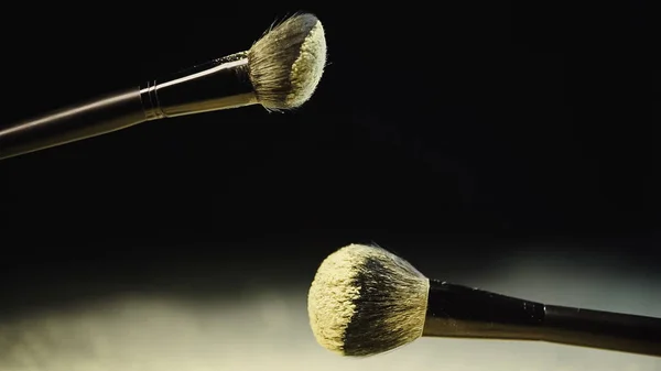 Soft Cosmetic Brushes Yellow Powder Black Background — Stock Photo, Image