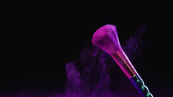 Cosmetic Brush Purple Powder Falling Dust Black Background — Stock Photo, Image