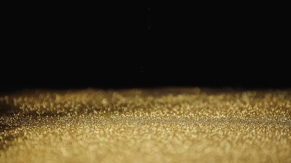 Polvo Dorado Brillante Con Brillo Sobre Fondo Negro — Foto de Stock