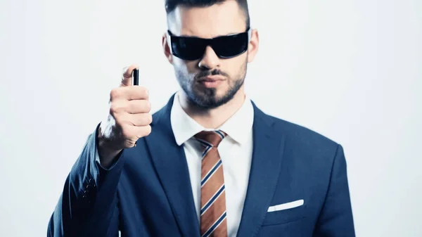 Blurred Businessman Dark Sunglasses Holding Pen Isolated White — Stock Photo, Image