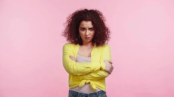 Upset Curly Woman Standing Crossed Arms Isolated Pink — Stock Photo, Image