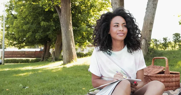 Cheerful African American Woman Writing Notebook Park — Stock Photo, Image