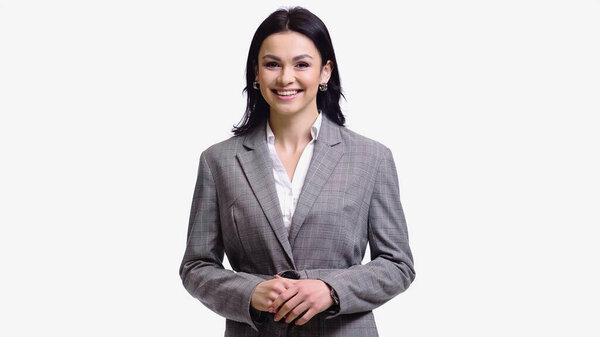 Brunette businesswoman smiling at camera isolated on white