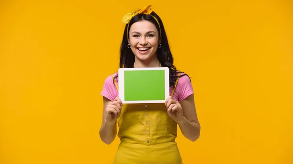 Positive Woman Holding Digital Tablet Green Screen Isolated Yellow — 图库照片