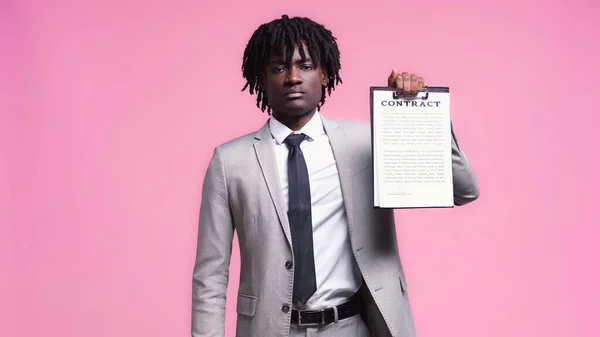 African American Man Suit Holding Clipboard Contract Lettering Isolated Pink — Stock Photo, Image