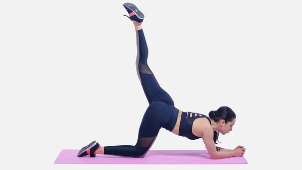 Full Length Young Woman Sportswear Stretching Pink Fitness Mat White — Stock Photo, Image