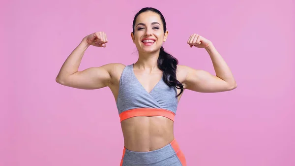 Joyful Sportswoman Showing Muscles Isolated Pink — Stock Photo, Image