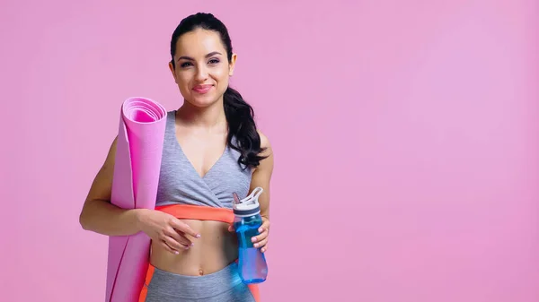 Happy Sportswoman Holding Sports Bottle Fitness Mat Isolated Pink — Stock Photo, Image