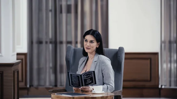 Pleased Businesswoman Holding Menu Lobby Restaurant — Stock Photo, Image