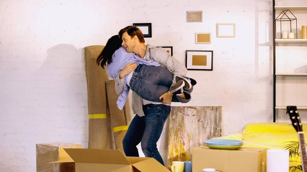 Happy Man Holding Arms Girlfriend New Home — kuvapankkivalokuva