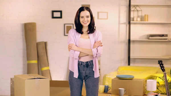 Cheerful Woman Standing Crossed Arms New Home — Stock Photo, Image