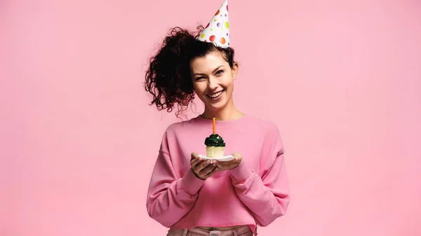 Pleased Woman Showing Birthday Cupcake Isolated Pink — Stock Photo, Image