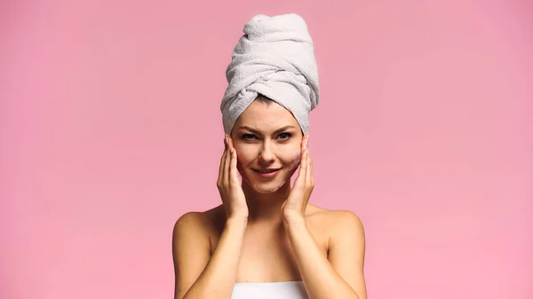 Pleased Woman Applying Facial Mask Smiling Camera Isolated Pink — Stock Photo, Image