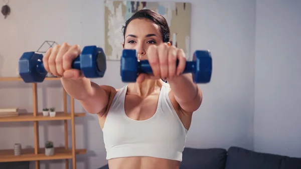 Sportswoman Training Blurred Dumbbells Home — Stock Photo, Image