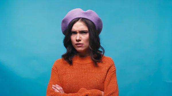 Distrustful Woman Purple Beret Orange Jumper Looking Camera Isolated Blue — Stock Photo, Image