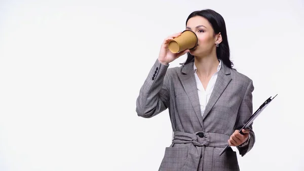 Businesswoman drinking coffee to go isolated on white — Stock Photo