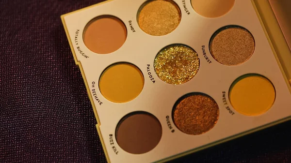 High angle view of set with colorful eye shadow with shimmer — Stock Photo