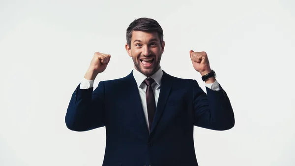 Excited manager in suit showing yes gesture isolated on white — Stock Photo