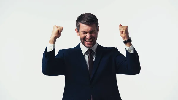 Businessman with closed eyes showing yes gesture isolated on white — Stock Photo