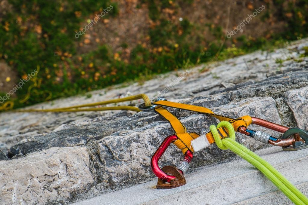 Close-up of a rock climbing rope with hooks on rock Stock Photo by ©nacroba  87609848