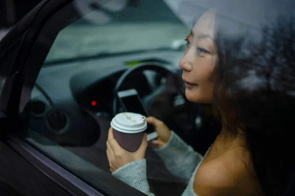 Woman On Road Trip Traveling By Car Relaxing With Coffee Cup Adventure