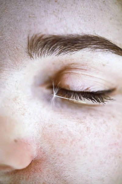 Woman Face Falling White Seeds Dandelions Close Eyelash — Zdjęcie stockowe