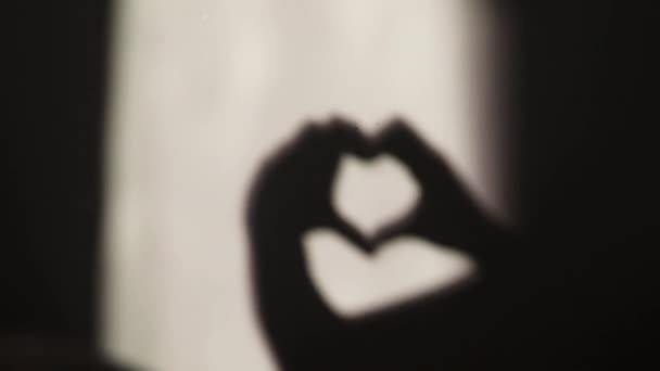 Woman Making Heart Shadow Her Hands Wall — Stock Video