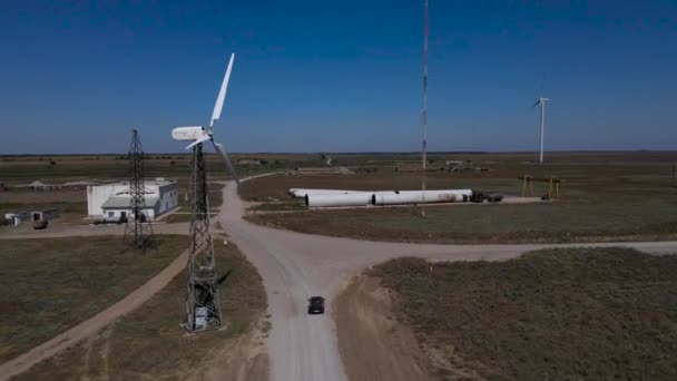Black Car Moves Road Wind Turbines Shooting Drone Quadrocopter — Stock Video