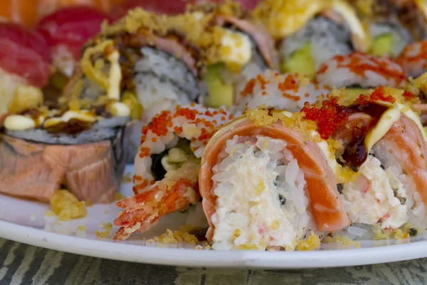 Sushi rolls with vassabi on the plate — Stock Photo, Image