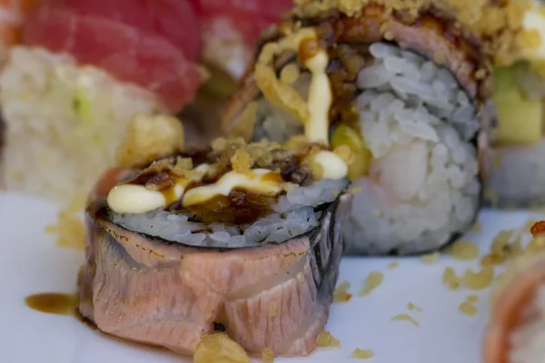 Sushi rolls with vassabi on the plate — Stock Photo, Image