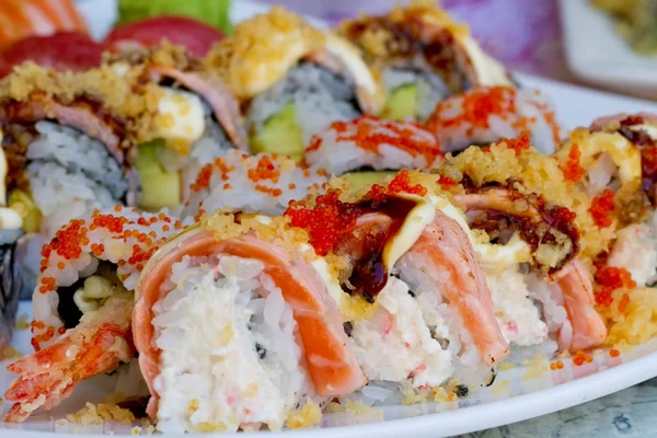 Sushi rolls with vassabi on the plate — Stock Photo, Image