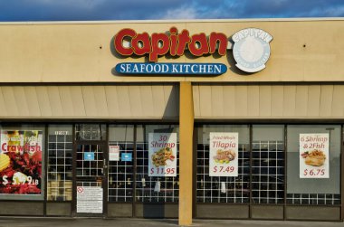 Houston, Texas USA 11-26-2020: Houston, TX 'teki Kaptan Deniz Ürünleri Mutfağı. Cajun ve Creole tarzı bir restoran..
