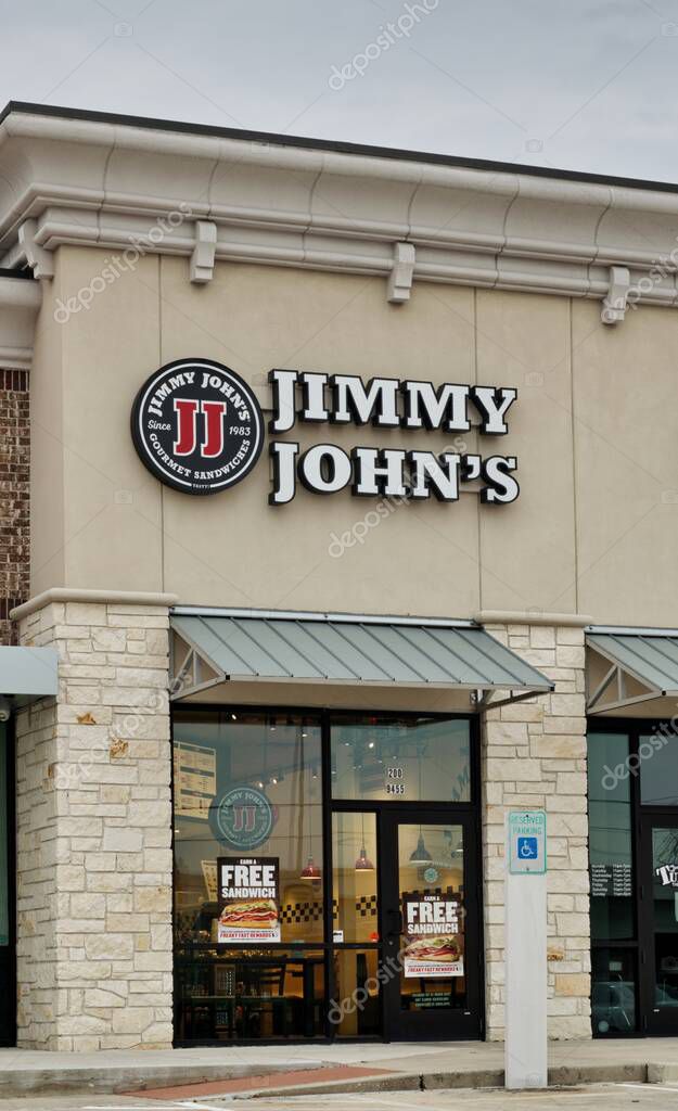 Humble, Texas USA 01-01-2020: Jimmy Johns storefront in Humble, TX in vertical format. American sandwich fast food restaurant chain, founded in 1983.