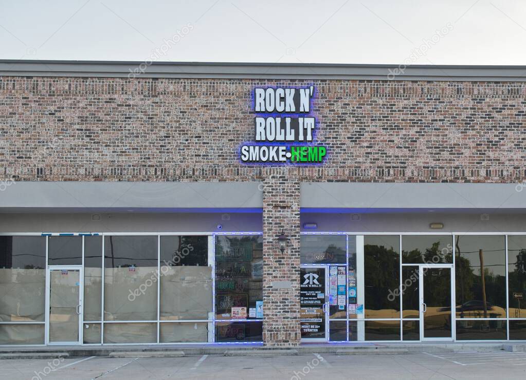 Houston, Texas USA 08-24-2025: Rock n' Roll It smoke shop storefront exterior local strip mall.