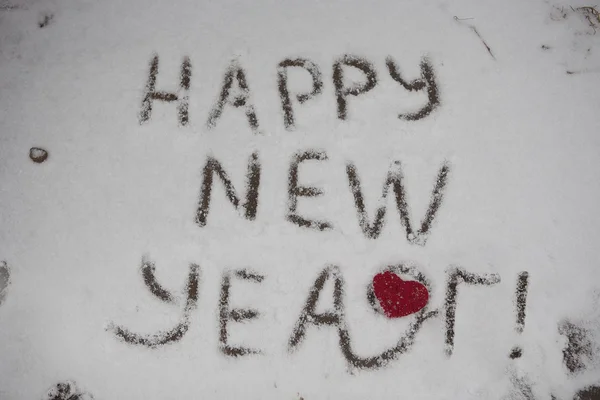 Inscription Happy New Year written on the snow — Stock Photo, Image