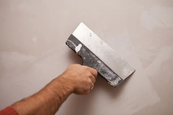 duvar el bir spatula, iş ile hizalar