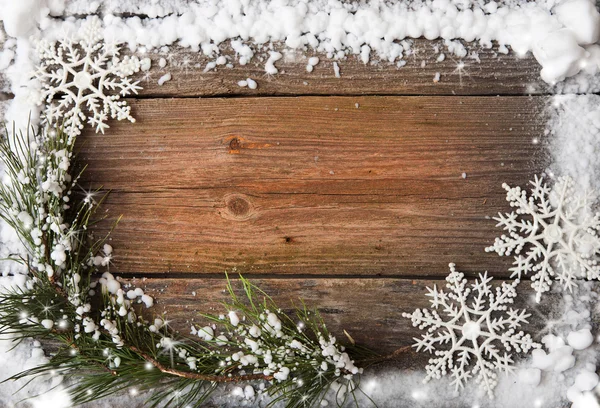 Snow fir tree with cones over wooden background, copy space — Stock Photo, Image