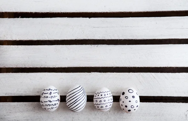 Easter eggs on wooden background — Stock Photo, Image