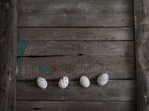 Easter eggs on wooden background — Stock Photo, Image